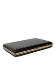 dolce-gabbana-black-gold-clutch-angled