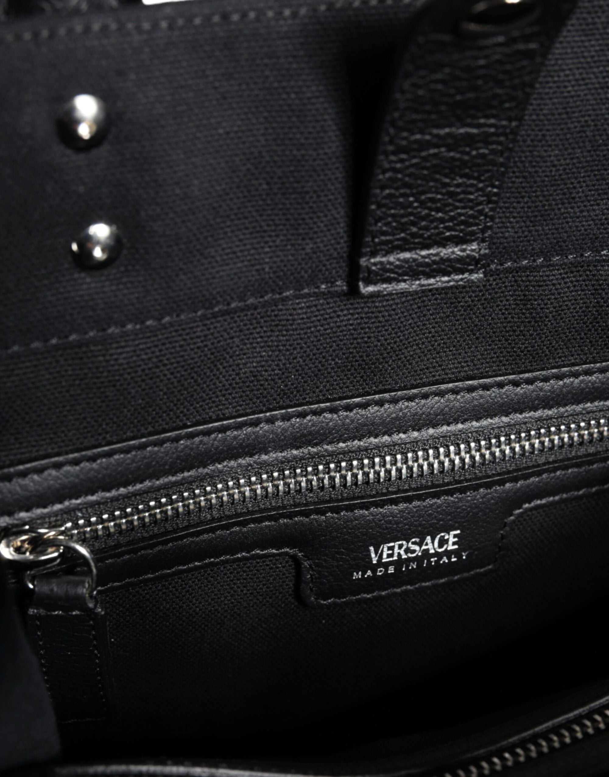 versace-black-canvas-leather-tote-closeup-logo