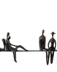 Figuren op een bank beeld - brons | Leisure | H. 23 cm