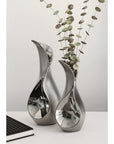 Moderne druppelvormige vaas in zilver | Matello | H. 23 cm