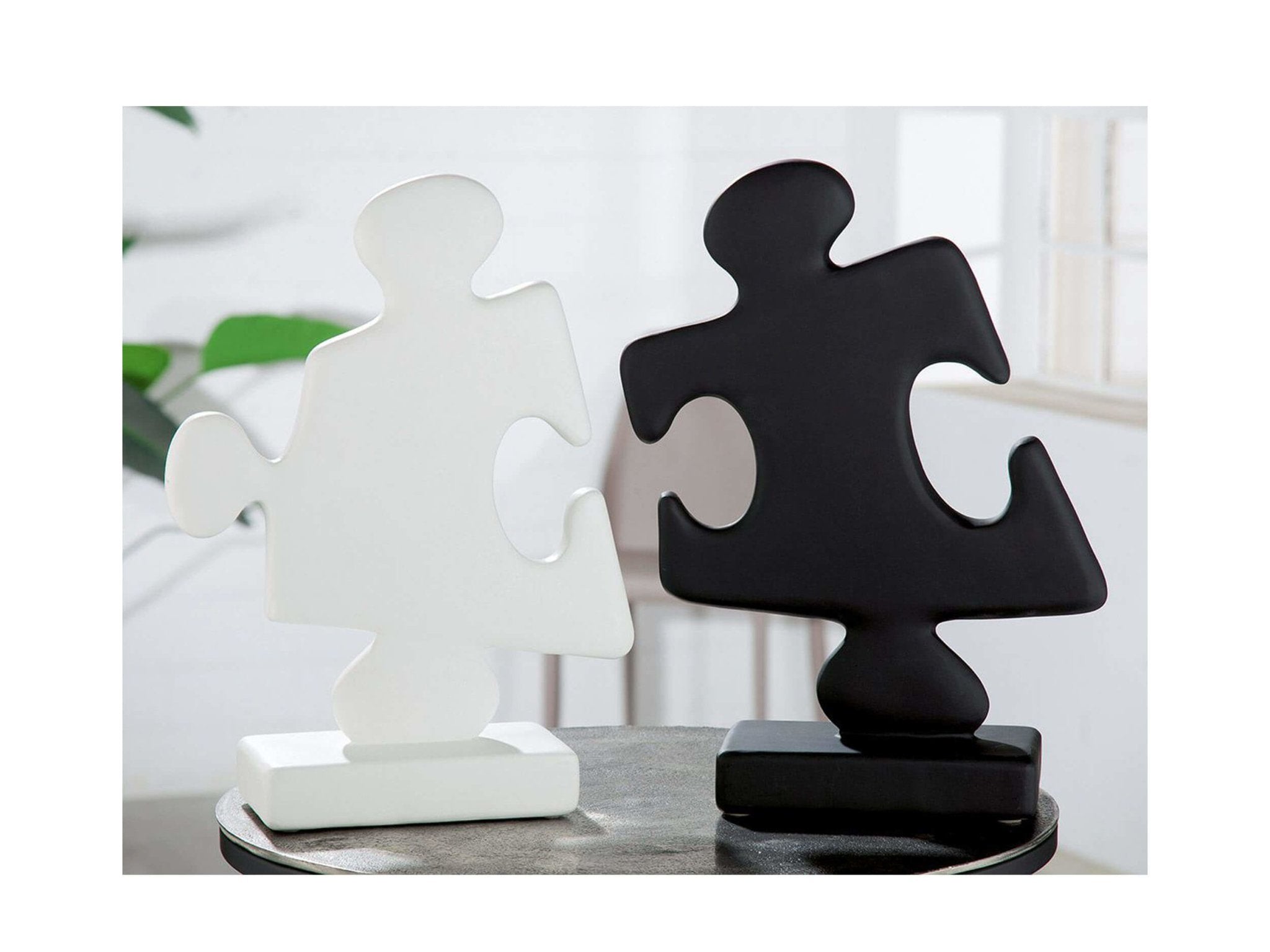 Decoratieve puzzelstukken verkrijgbaar in wit en zwart